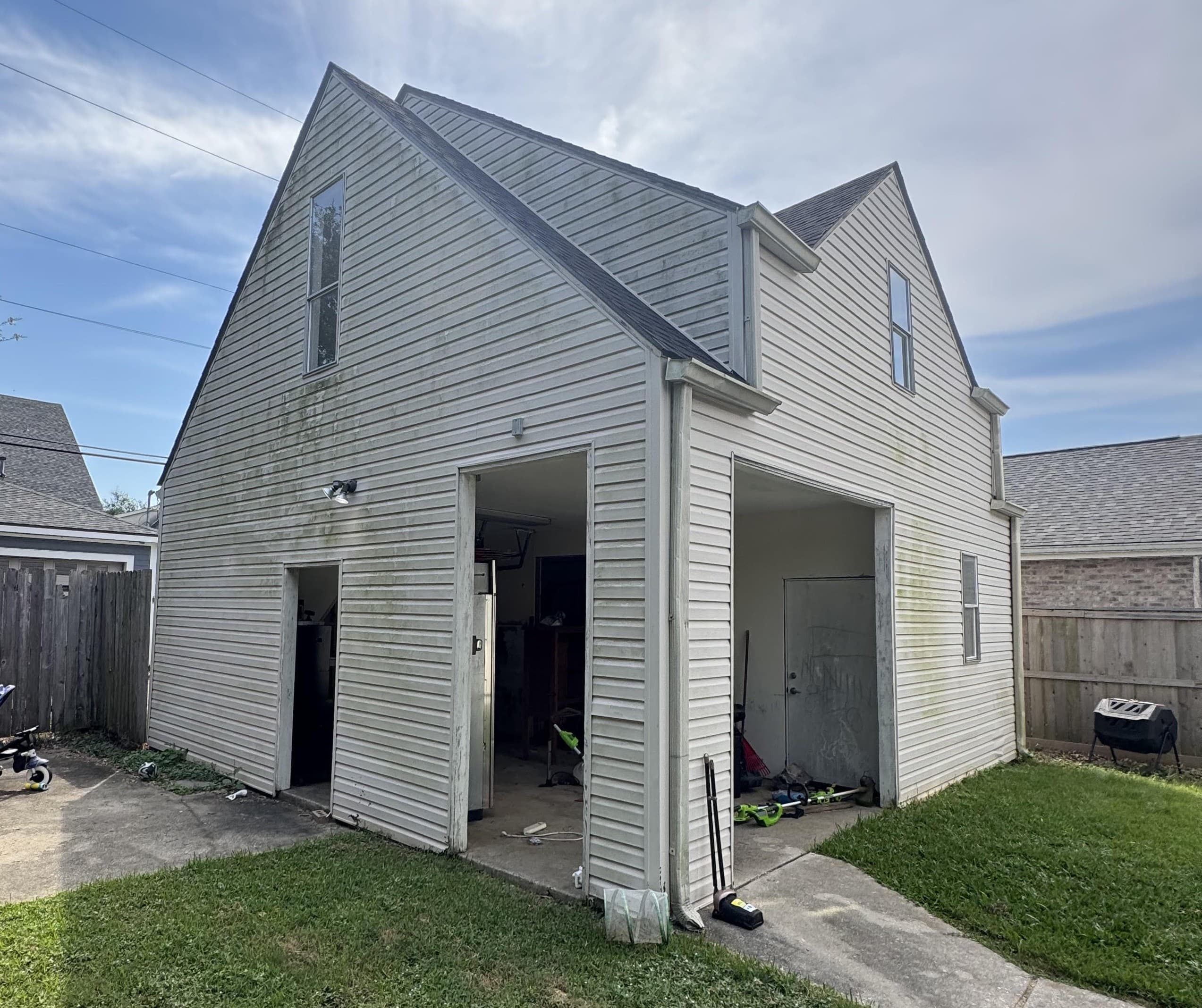 Garage Siding Makeover before cleaning